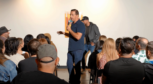 Comedian working the crowd mid-story at Arizona After Dark