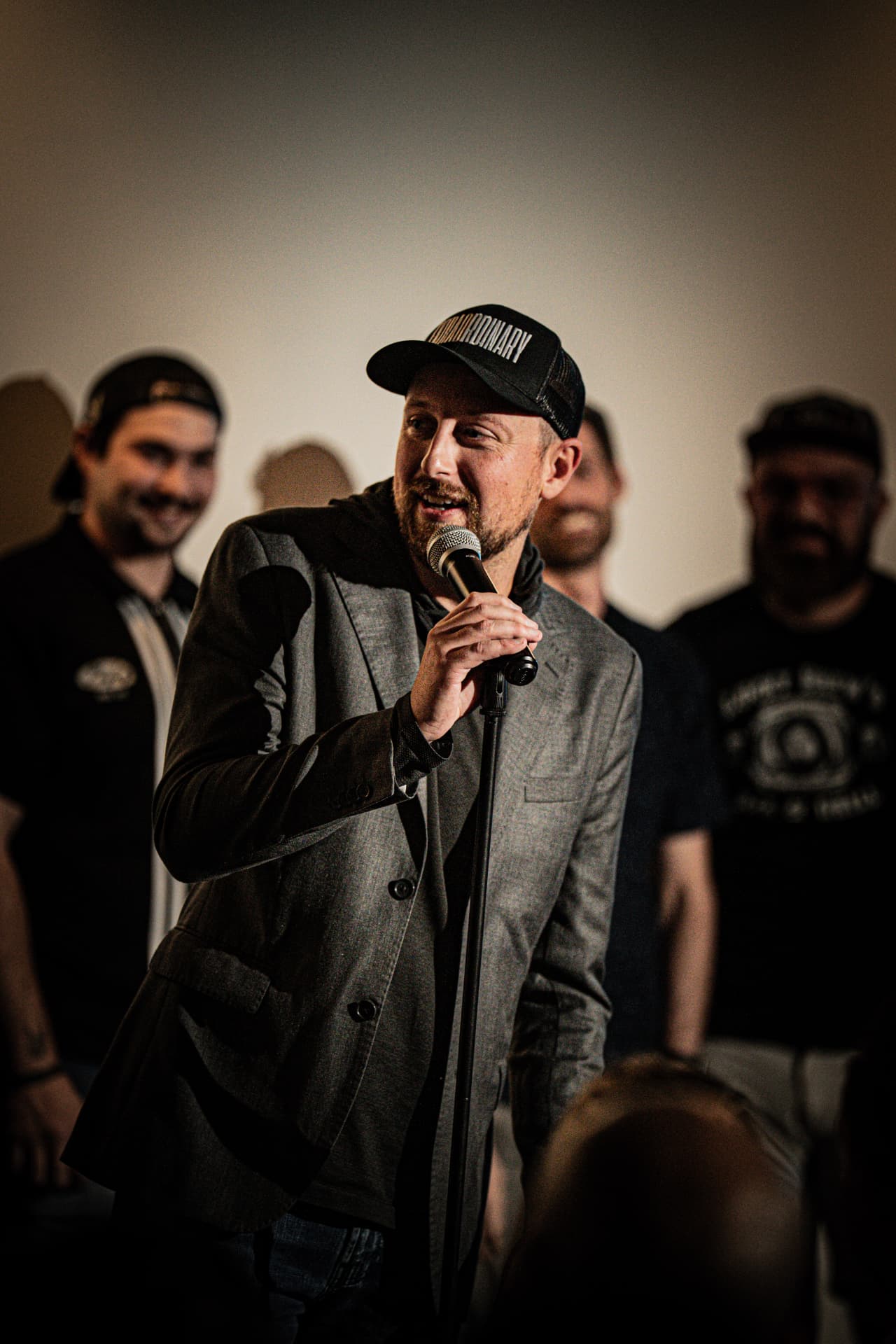 Host addressing the room at Arizona After Dark