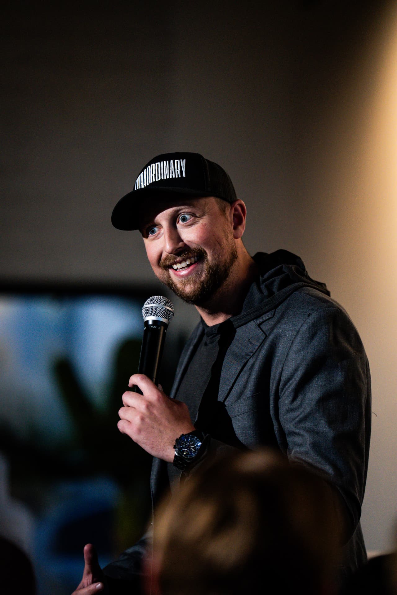 Host pulling a face mid-bit at Arizona After Dark